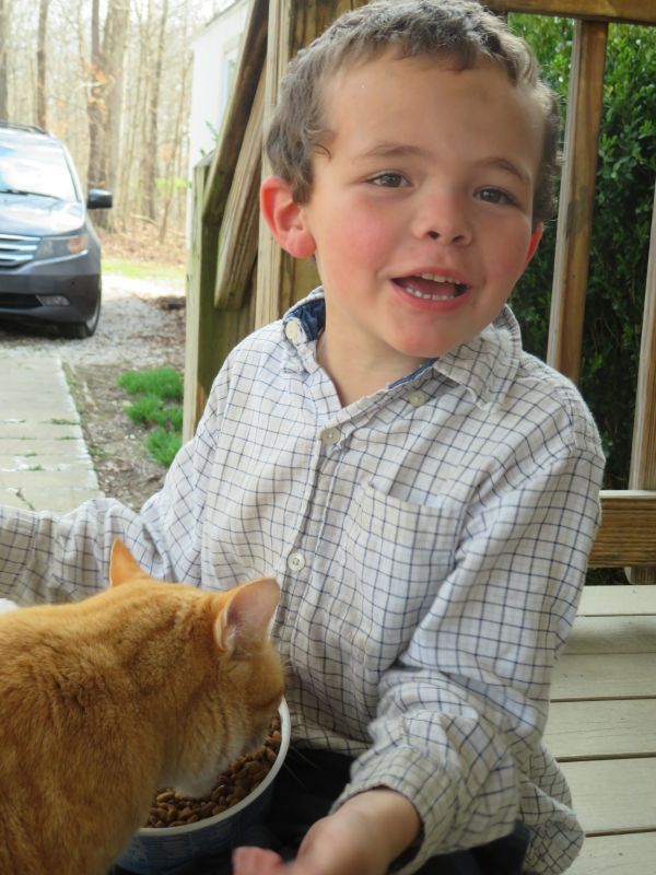 Wyatt Feeding His Cat, Shadow