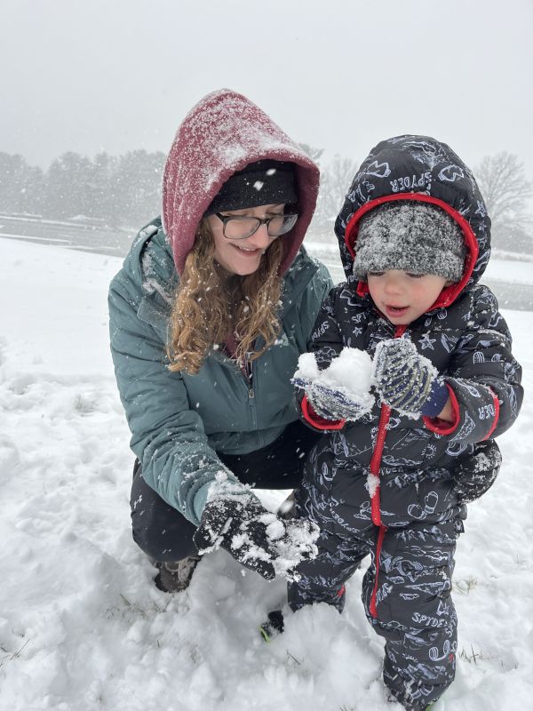 Teaching Elijah How to Make a Snowball